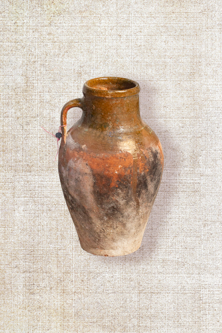 One handle distressed glazed vessel 124